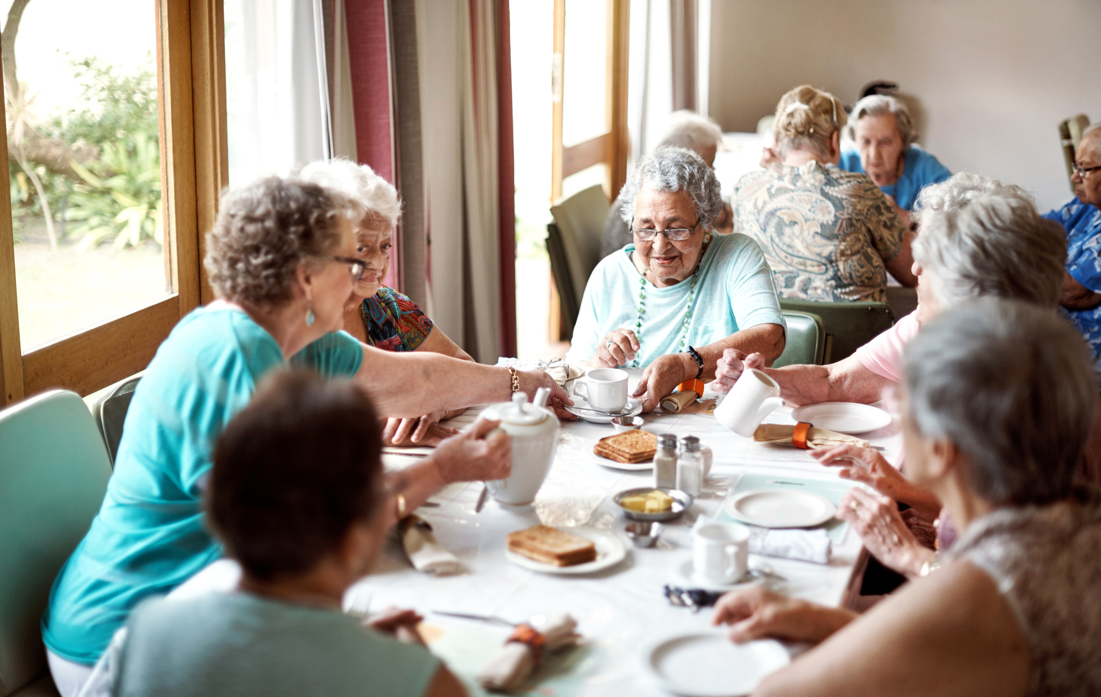 elderly ladies having tea
